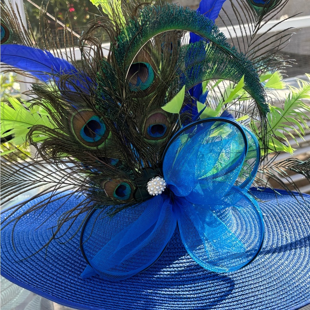Vibrant Blue and Green Feathered Hat with Dramatic Brim